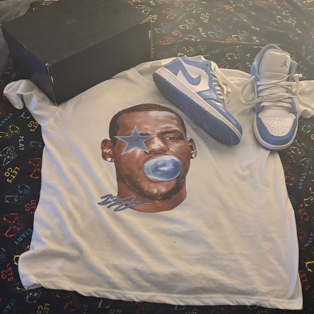 White Graphic Tee and Blue Sneakers